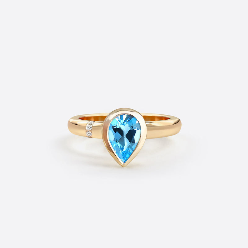 bague en forme de poire en or rose 18k sertie d une pierre topaze bleue et diamants