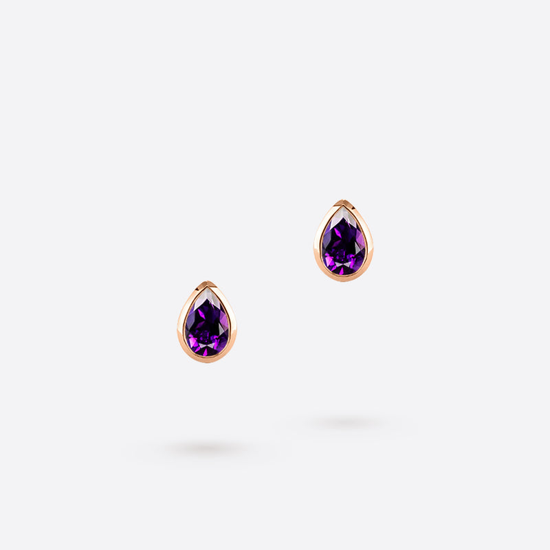 boucles d oreilles studs en or rose 18k serties de pierres amethyste violettes