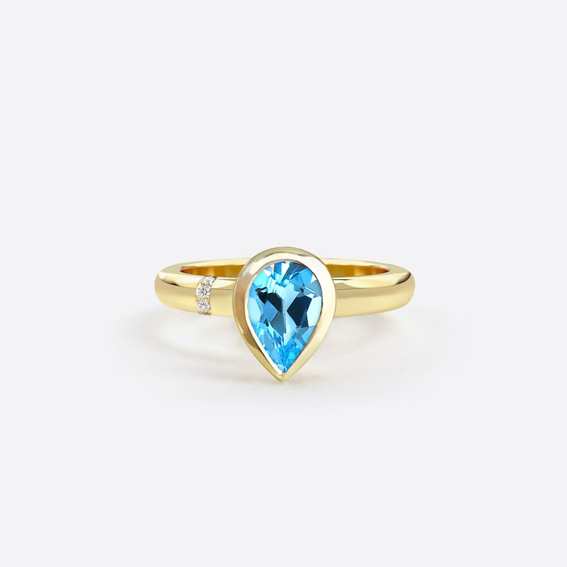 bague en forme de poire en argent plaque or jaune sertie d une pierre topaze bleue et diamants