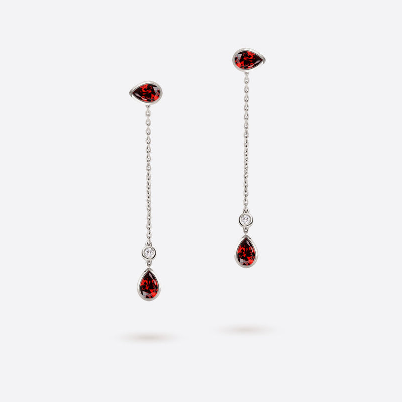 boucles d oreilles pendantes en forme de poire en or blanc 18k serties de pierres grenat rouges et diamants