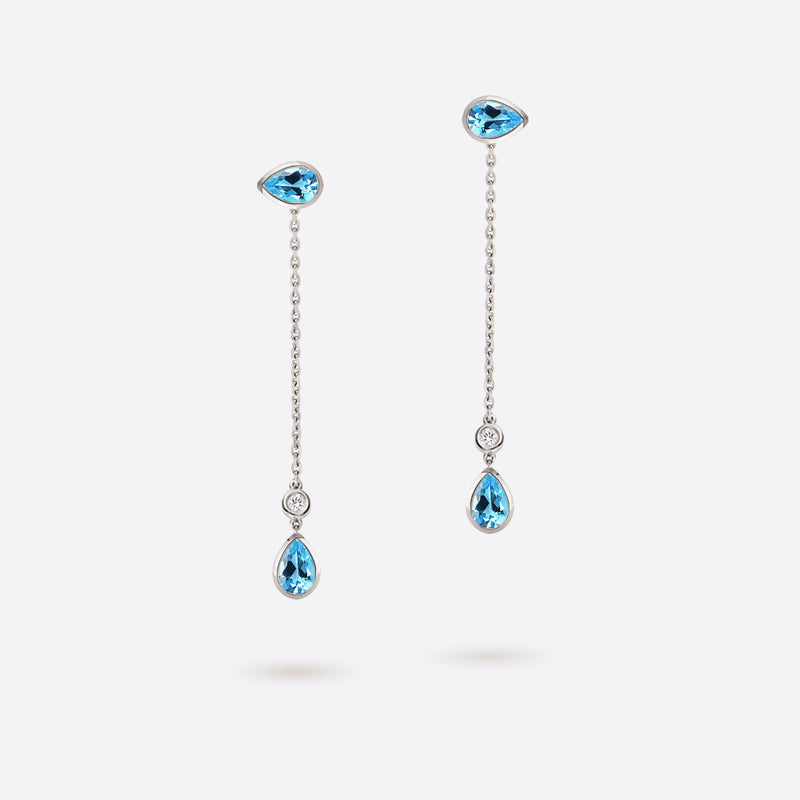 boucles d oreilles pendantes en forme de poire en argent rhodie serties de pierres topaze bleue et diamants