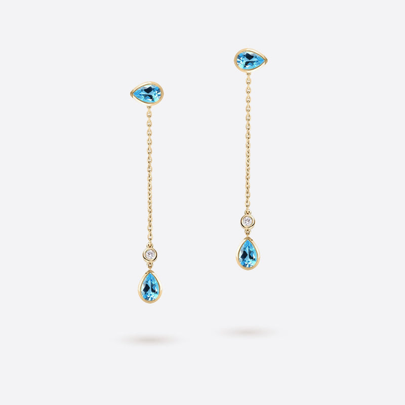 boucles d oreilles pendantes en forme de poire en or jaune 18k serties de pierres topaze bleue et diamants