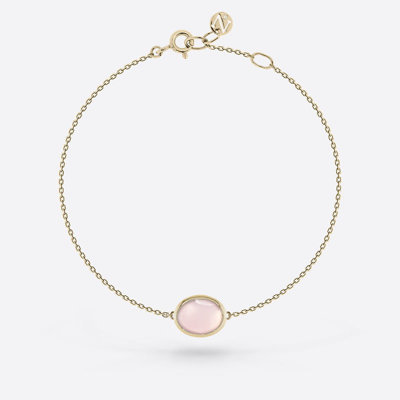 Bracelet chaîne or jaune  serti d une pierre quartz rose en forme ovale