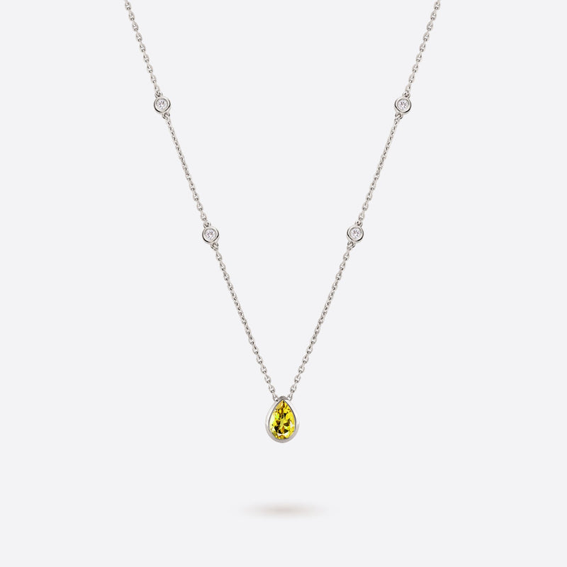 collier en or blanc 18k accompagne de diamants et citrine jaune en forme de poire