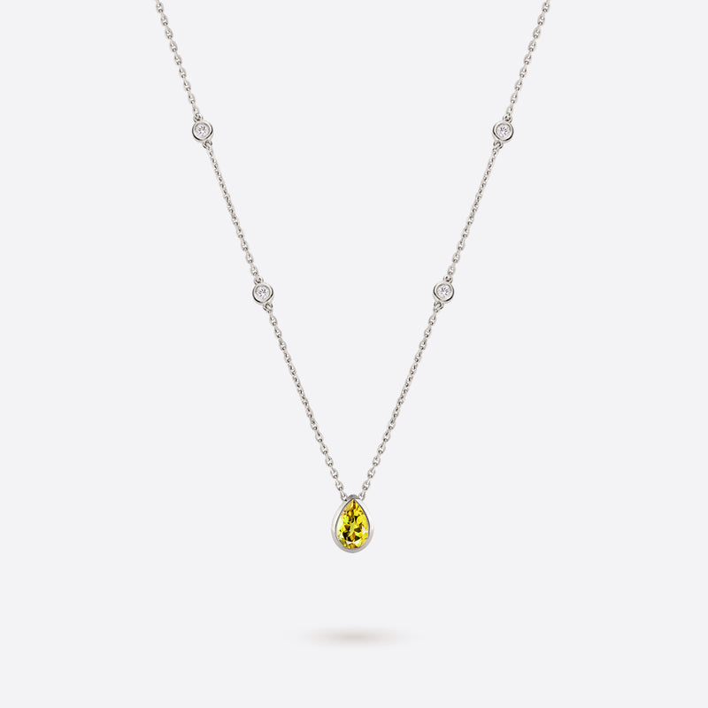 collier en argent rhodie accompagne de diamants et citrine jaune en forme de poire