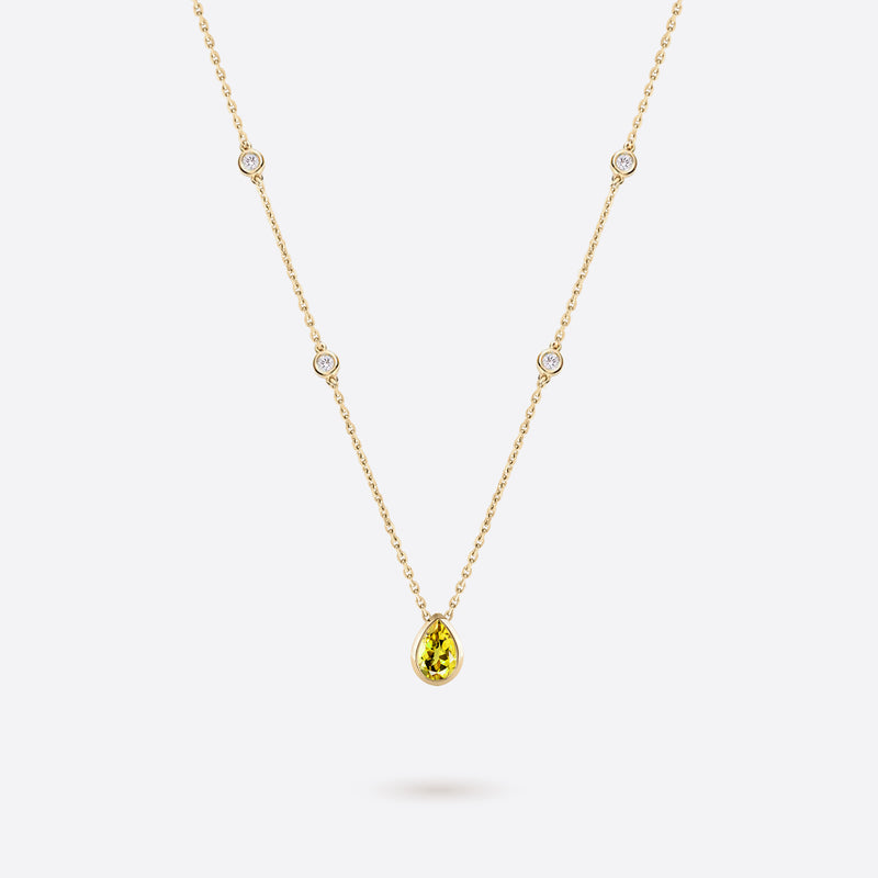 collier en argent plaque or jaune accompagne de diamants et citrine jaune en forme de poire