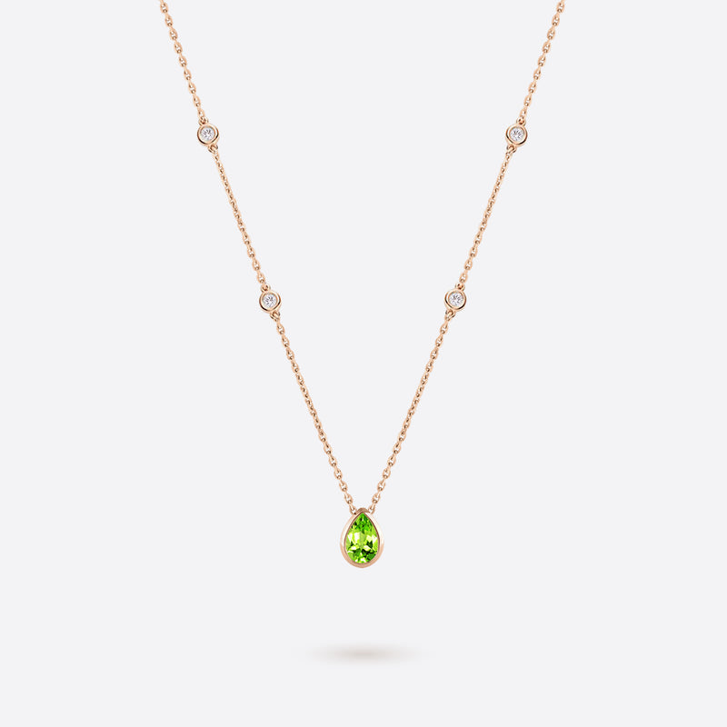 collier en or rose 18k accompagne de diamants et peridot vert en forme de poire