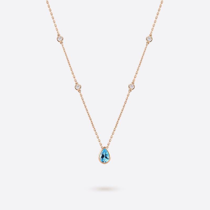 collier en argent plaque or rose accompagne de diamants et topaze bleue en forme de poire
