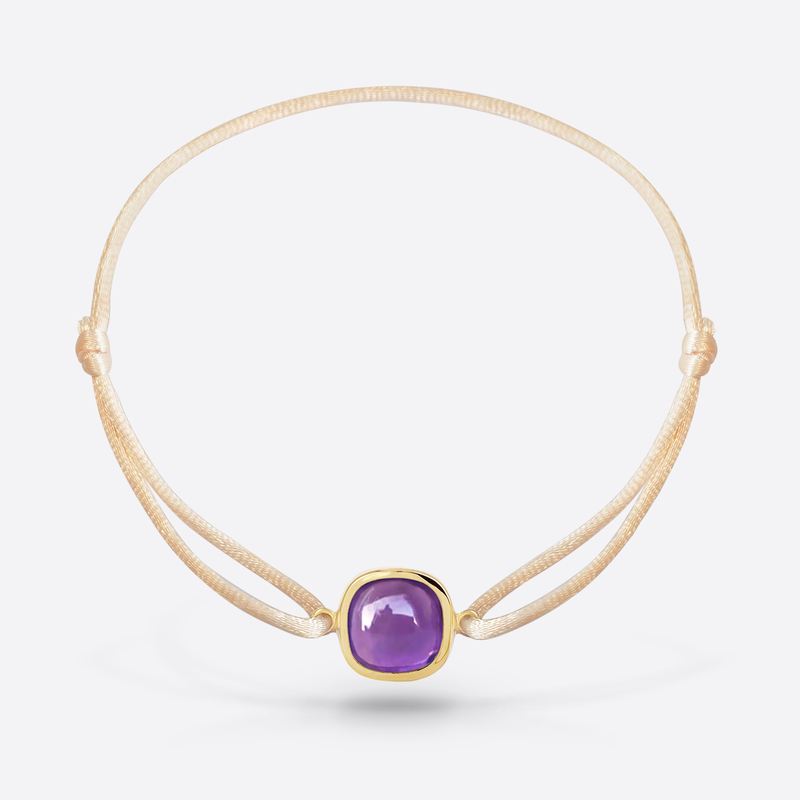 Bracelet cordon nude or jaune serti d une pierre fine amethyste